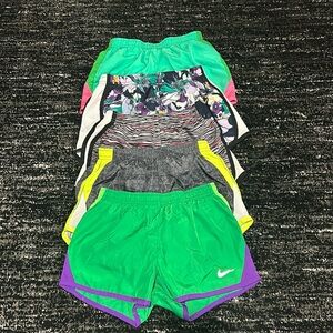 5 Pair Nike Dri-Fit shorts. 
No holes/stains
Size 6X Girls
